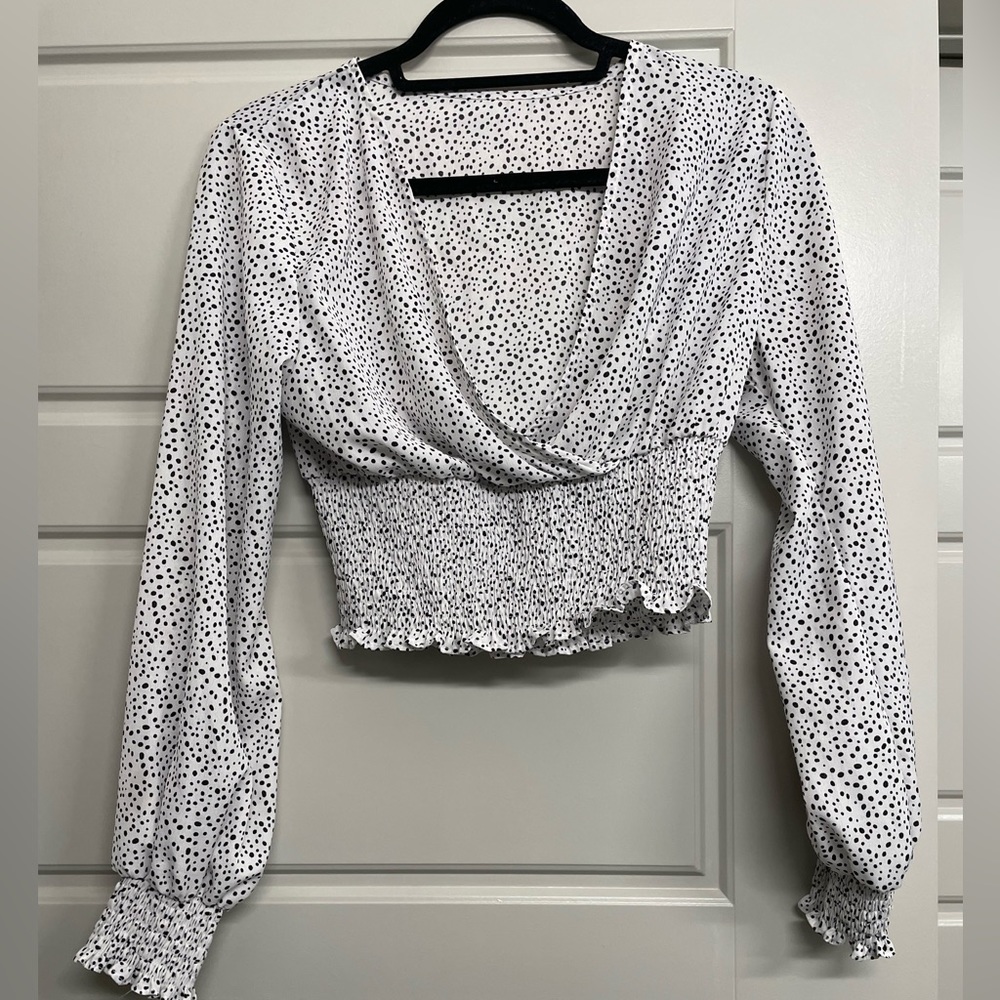 Polka dot top with singed bottom!